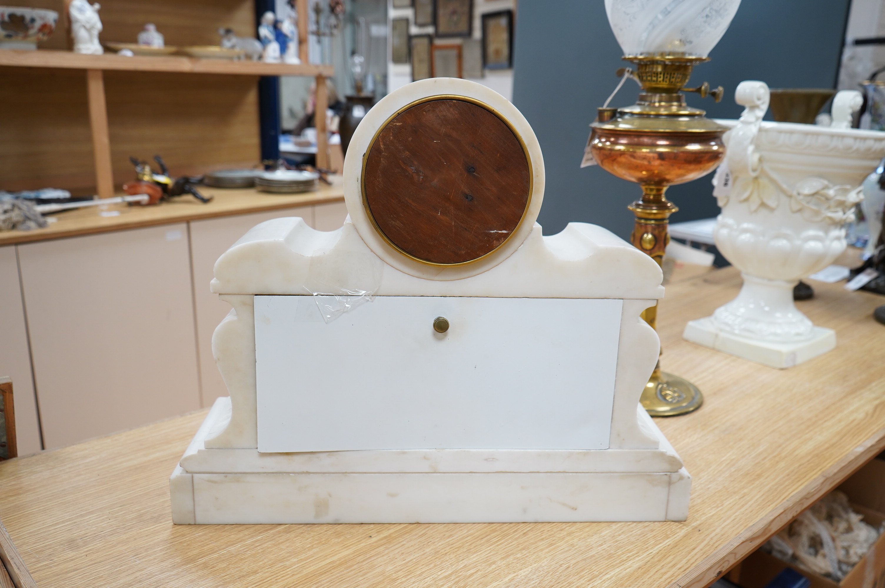 A good late 19th century white marble combination mantel clock, calendar and barometer, with sweep seconds hand, 52cm wide. Condition - fair to good